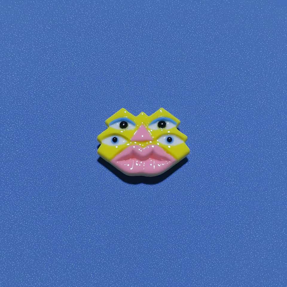 Four-Eyed Pixel Face Pin
