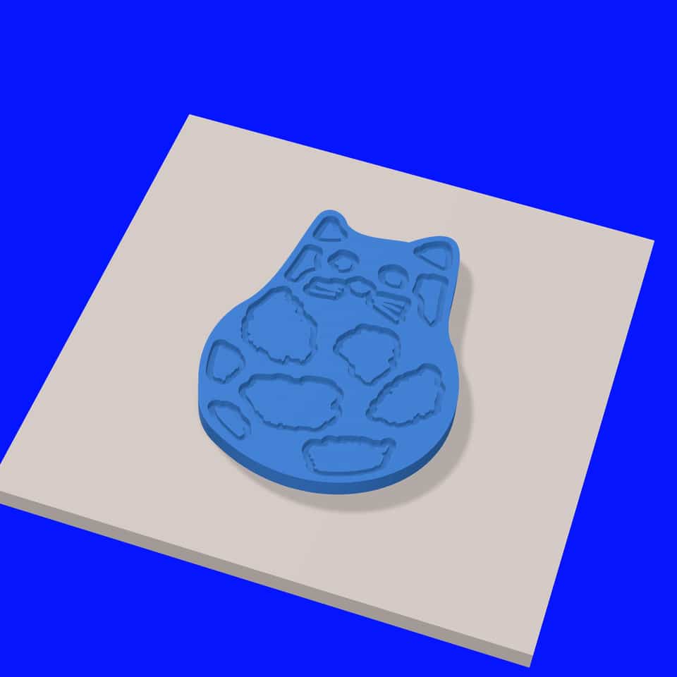 A plain 60 mm one-slab relief cat with the spots and face pressed in.