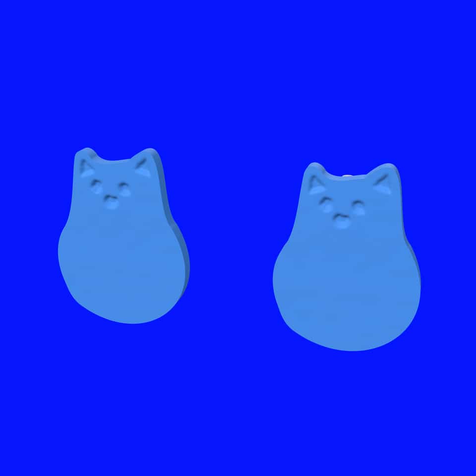 One-slab cat studs on flat-pad posts, shown from the front and back. Paint the spots and face after baking if you like.