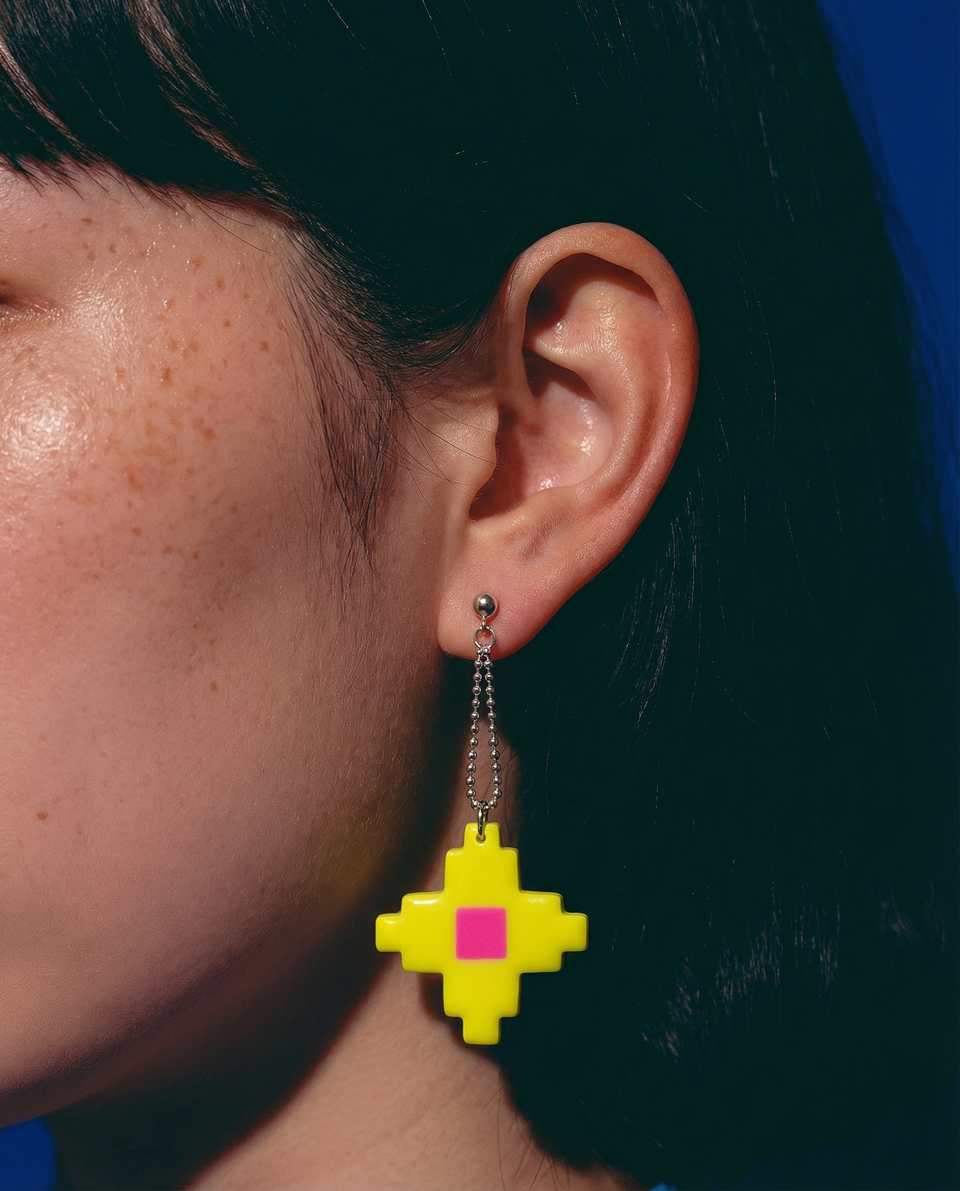 Yellow Polymer Clay & Pink Pixel Star Bead Chain Dangle Earrings shown in styled wear context with size, drape, and hardware visible. Earrings using pixel construction with a glos…
