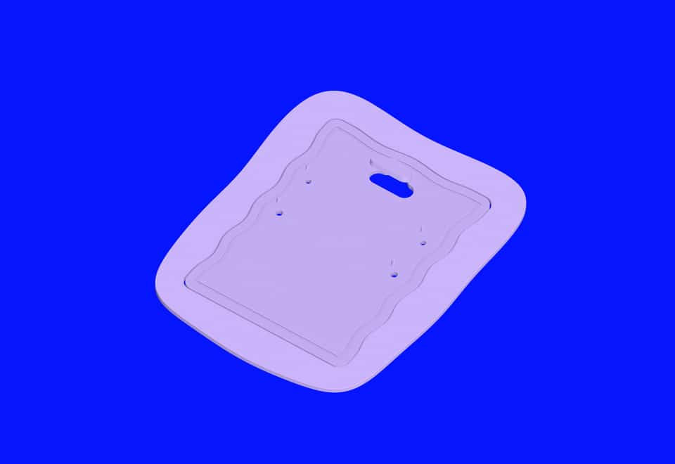 Clear the hanger and four round plugs while the surrounding slab still supports the card; then peel the outside waste.