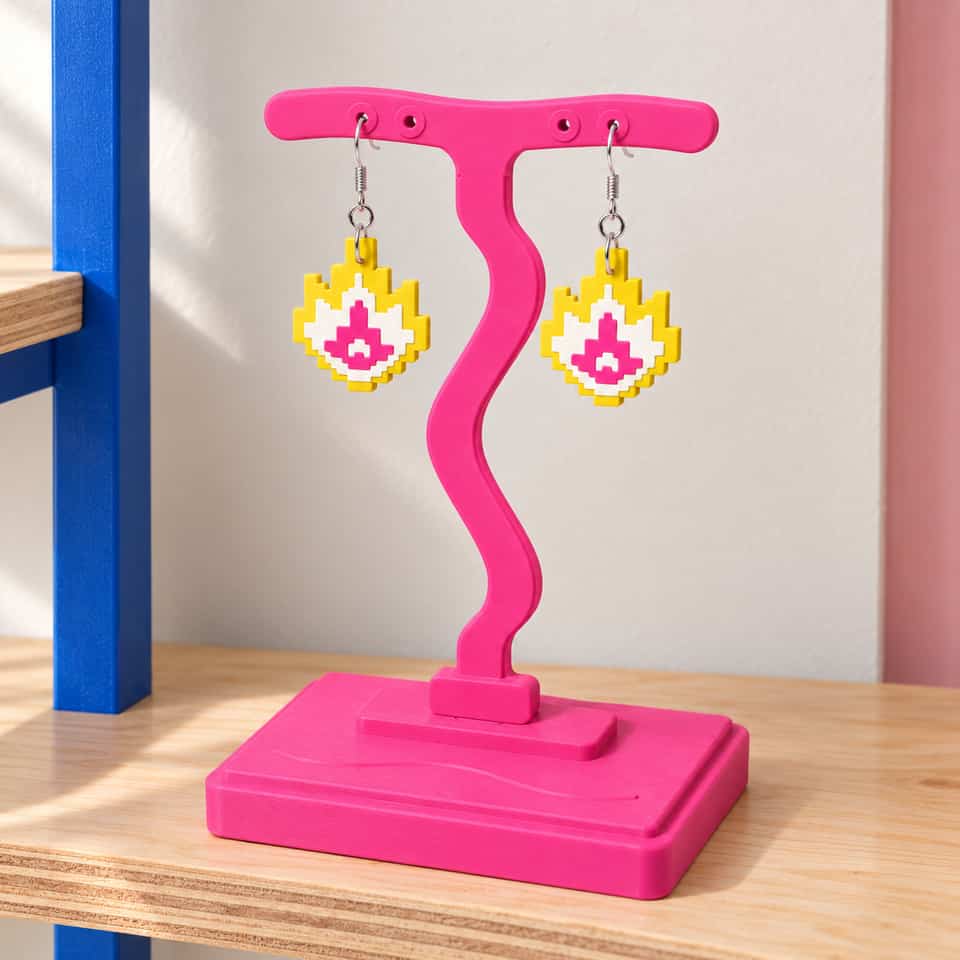 Pink Softwave Medium stand and one 32 mm pair on a plywood shelf.