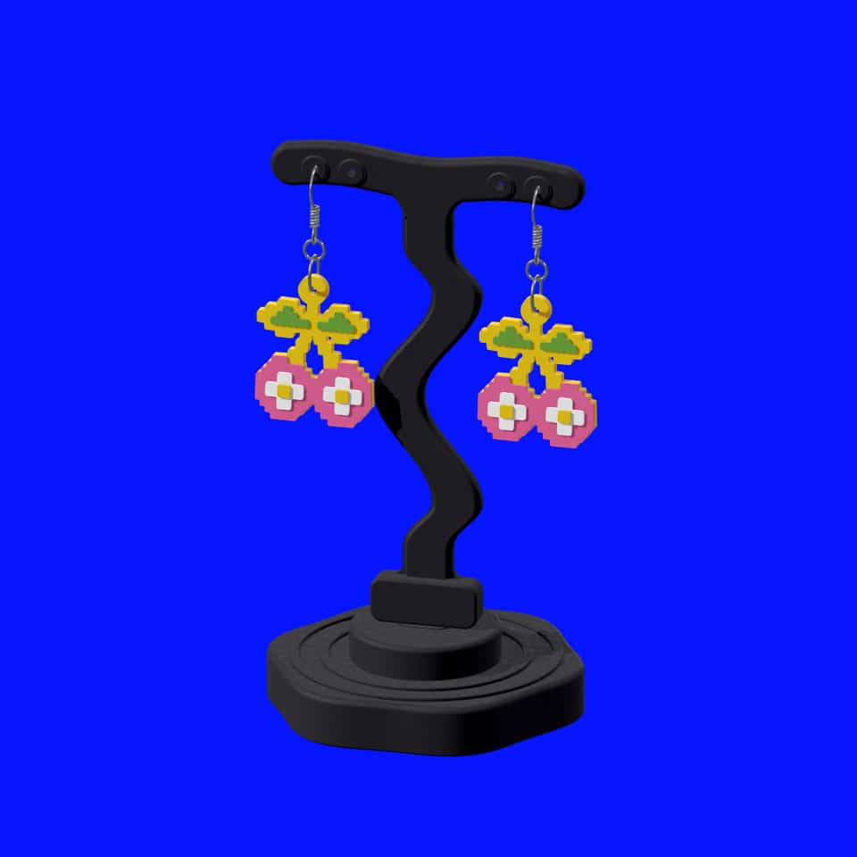 Black Short Softwave T-bar on a Compact Round base with one complete pair of layered Cherry drop earrings.