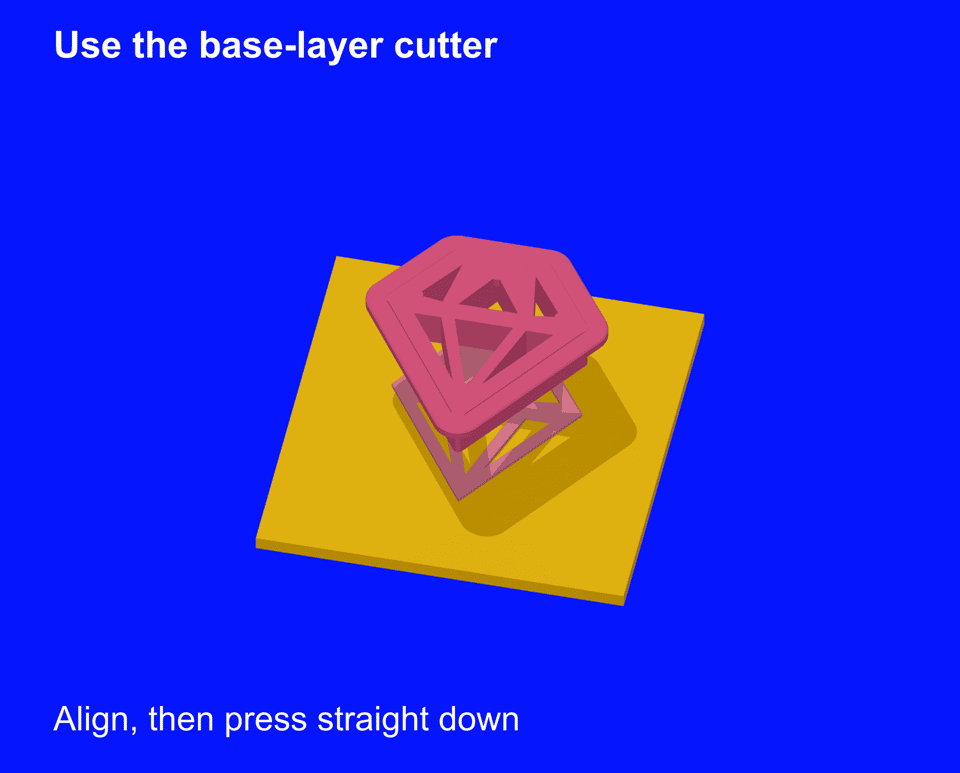 The final outline cutter over the pink outline. Press once, peel the yellow waste away and leave the gem on its tile to bake.