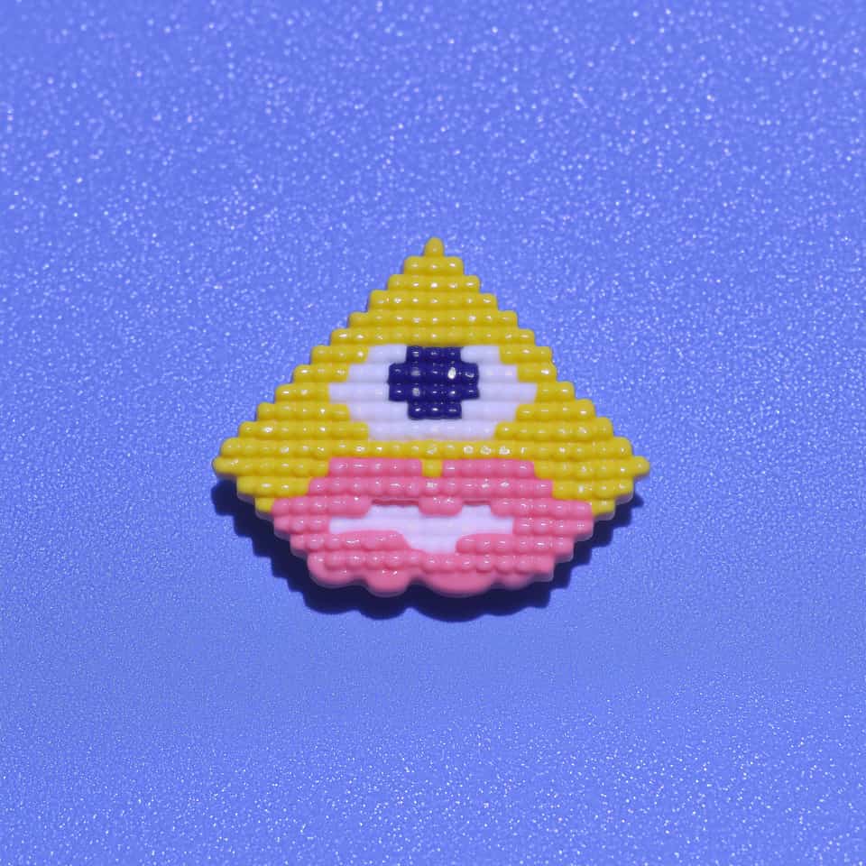 Polymer Clay Beaded Triangle Face Pin. Brooch made with surface applique with a light gloss finish. Make this diamond face pin as a flat plaque covered in tiny equal raised dots,…
