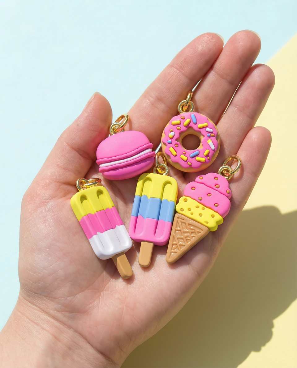 Polymer Clay Miniature Sweet Treat Charms shown in styled display context with object size and surface texture visible. Sculpting charms with a light gloss finish.