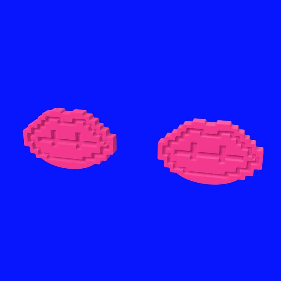 The 26 mm relief pair with the lip contour, mouth bar and tooth dividers pressed into one slab.