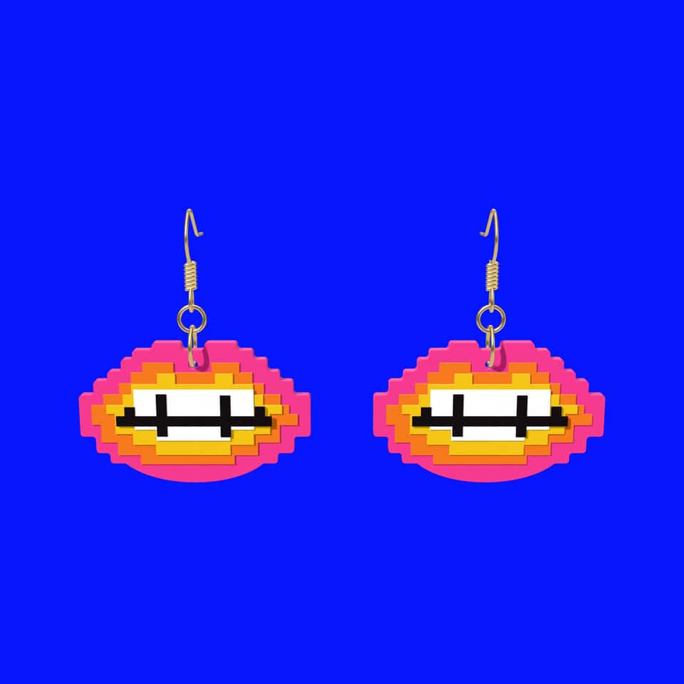 44 mm layered lips with their ear wires and jump rings attached.