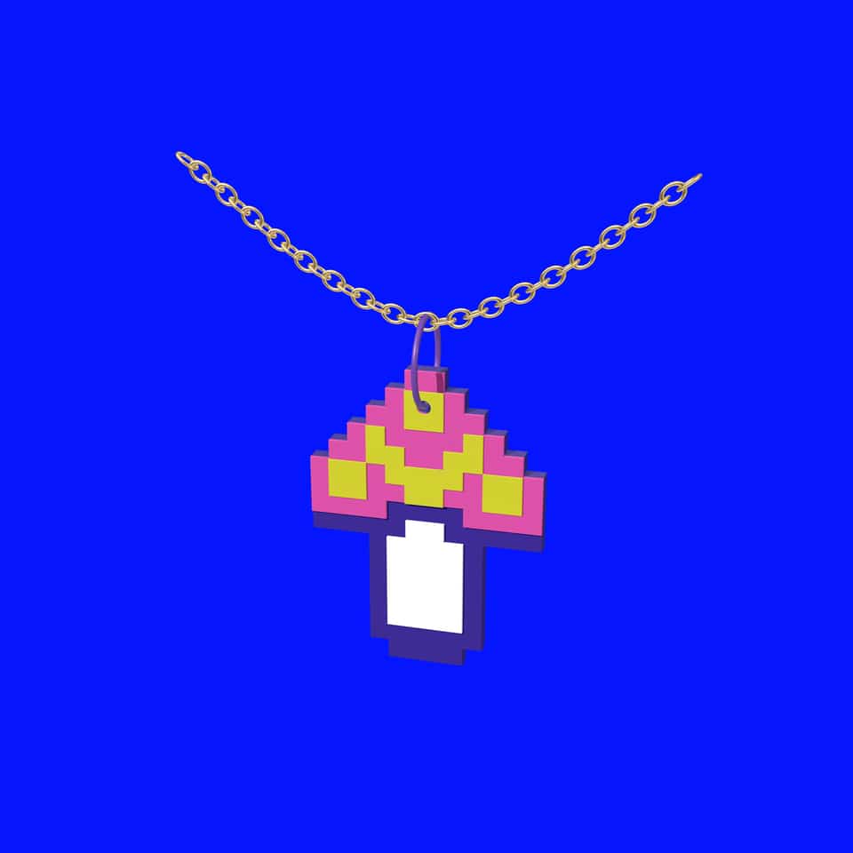 A layered Pixel Mushroom pendant hanging from a jump ring on a chain.