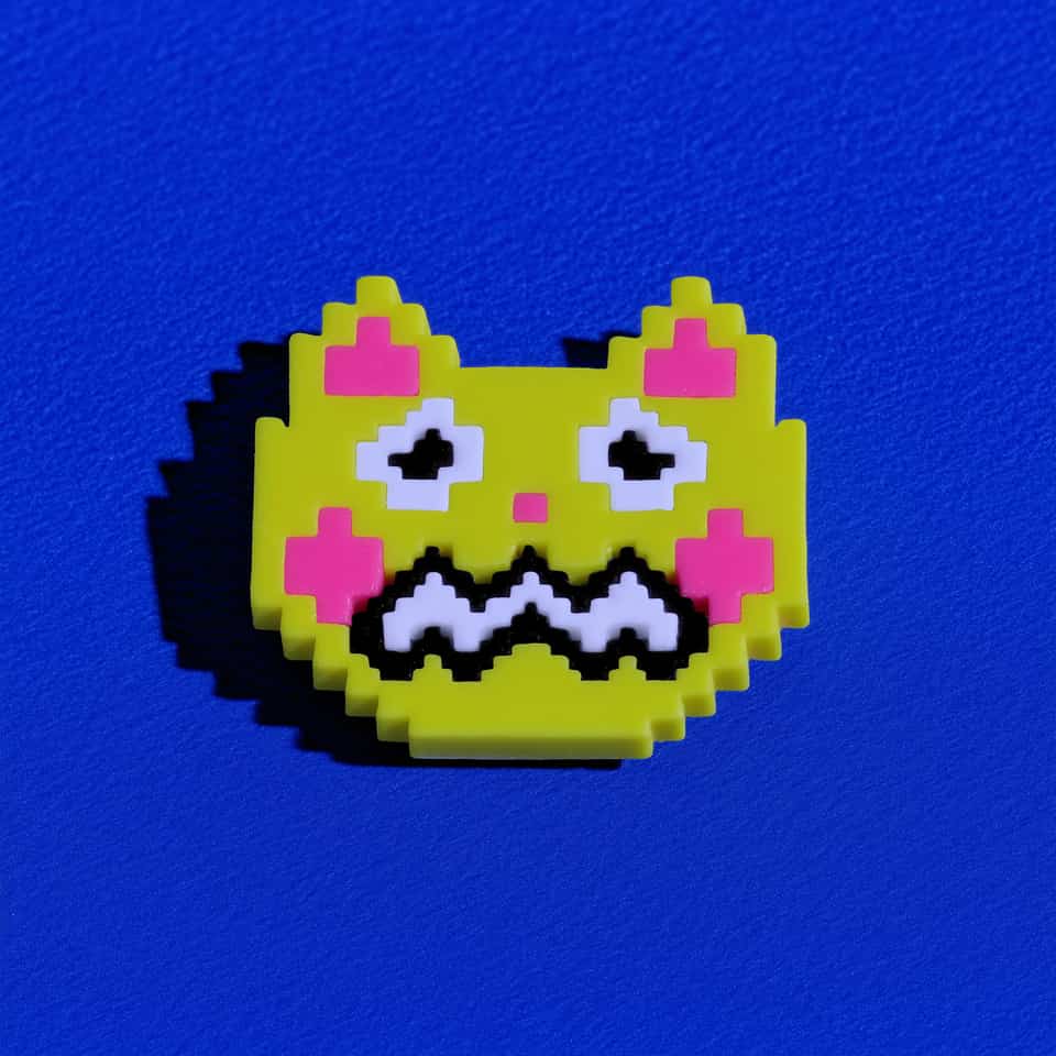 Polymer Clay Worried Pixel Cat Pin. Handmade brooch using pixel construction with a satin finish. Build the worried pixel cat brooch two ways: a flush rolled pixel mosaic or low-r…