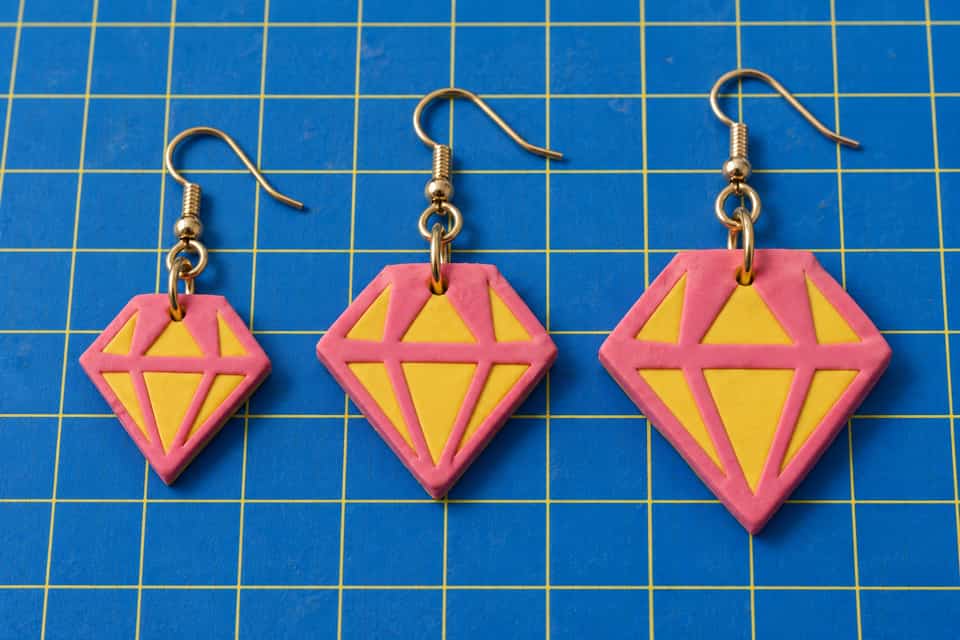 Three layered Faceted Gem drops on gold ear wires at 30, 34 and 38 mm, shown side by side.