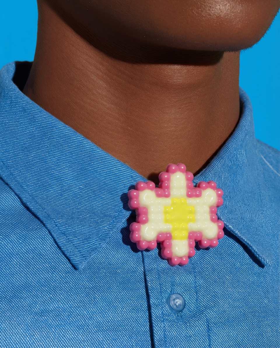 Polymer Clay Bobble Pixel Flower Pin shown in styled wear context with size, drape, and hardware visible. Handmade pixel construction brooch with gloss sealant finish.