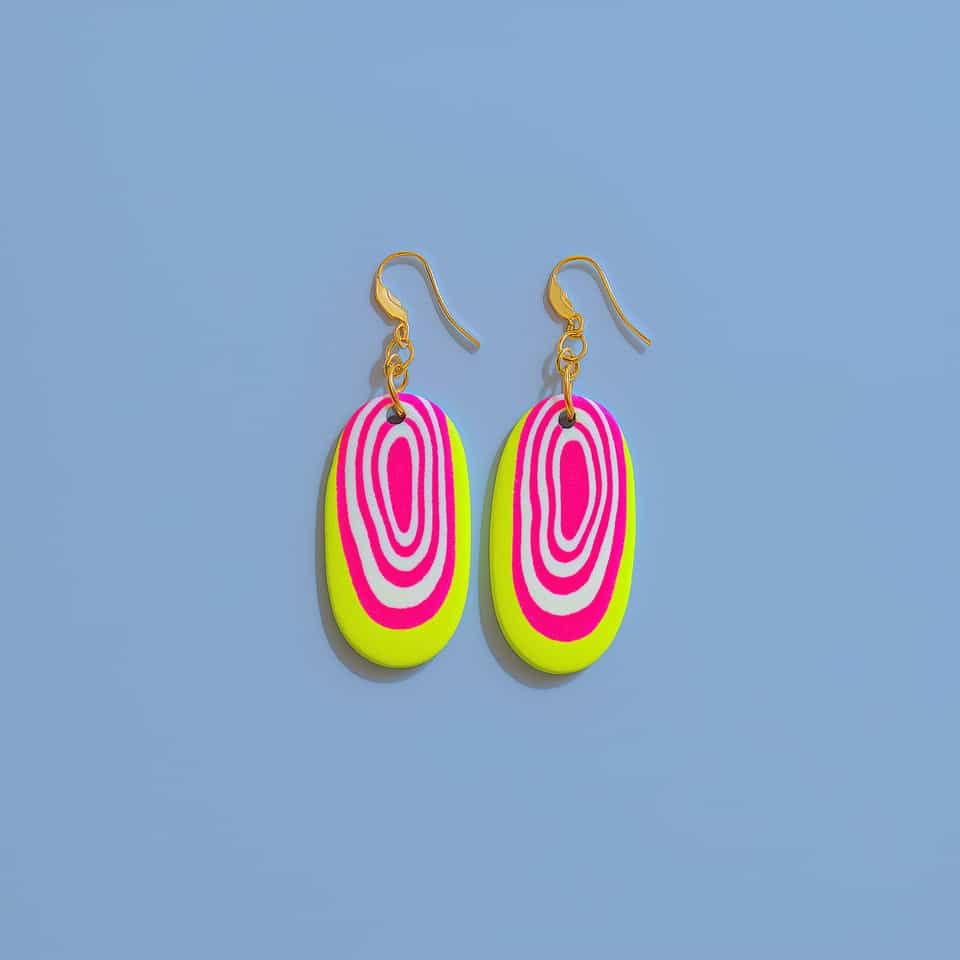 Polymer Clay Neon Bullseye Cane Oval Dangle Earrings. Earrings handmade in cane slice with matte sealant finish. Build a pink-and-white bullseye cane, stretch it to an oval profil…