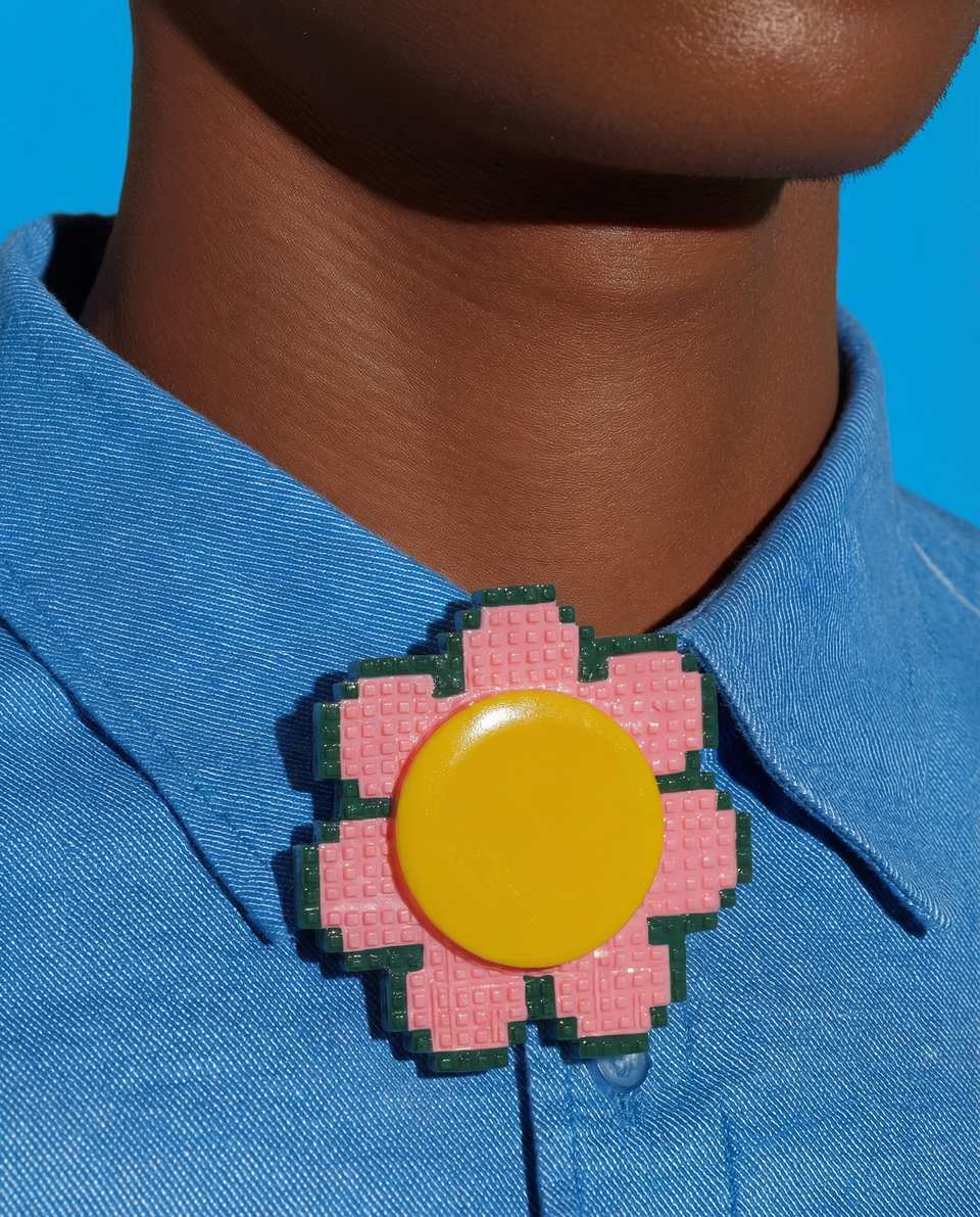 Polymer Clay Grid Pixel Flower Pin shown in styled wear context with size, drape, and hardware visible. Brooch handmade in slab construction with gloss sealant finish.