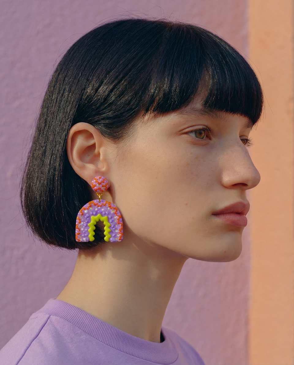 Lavender Polymer Clay Textured Arch Dangle Earrings shown in styled wear context with size, drape, and hardware visible. Handmade earrings using surface applique, finished with ma…