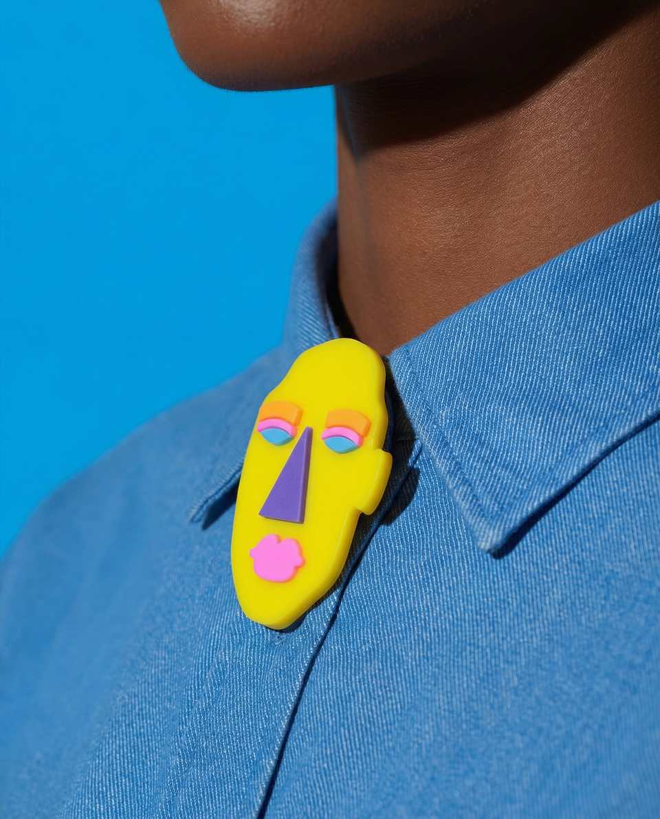 Polymer Clay Matisse-Style Abstract Face Pin shown in styled wear context with size, drape, and hardware visible. Handmade slab cutting brooch with matte sealant finish.