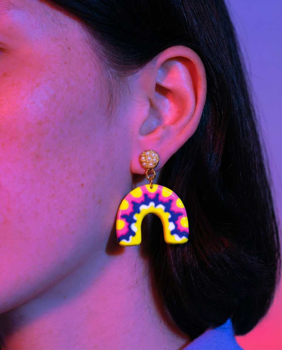 Pink Polymer Clay & Yellow Scalloped Arch Dangle Earrings shown in styled wear context with size, drape, and hardware visible. Handmade earrings using surface applique, finished w…