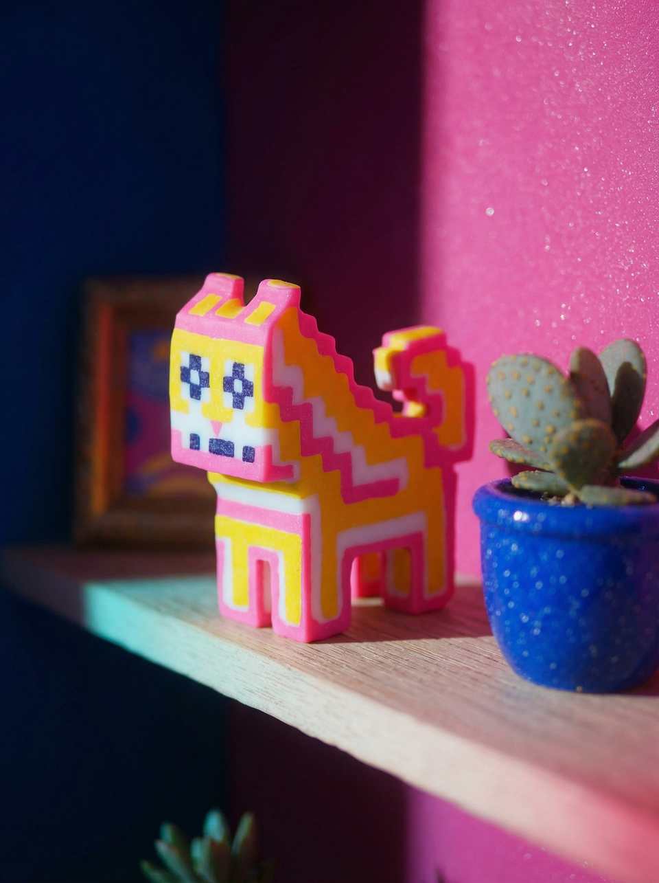 Polymer Clay Zigzag Pixel Cat Desk Buddy Figurine shown in styled display context with object size and surface texture visible. Sculpting figurine, hand-finished with gloss sealan…