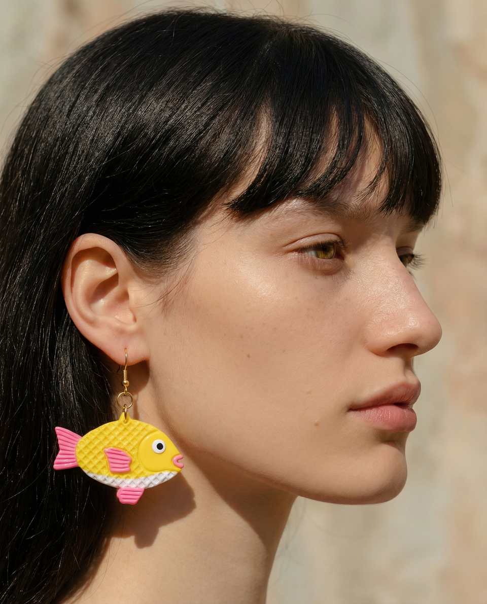 Polymer Clay Miniature Taiyaki Fish Dangle Earrings shown in styled wear context with size, drape, and hardware visible. Slab construction earrings, hand-finished with light gloss.