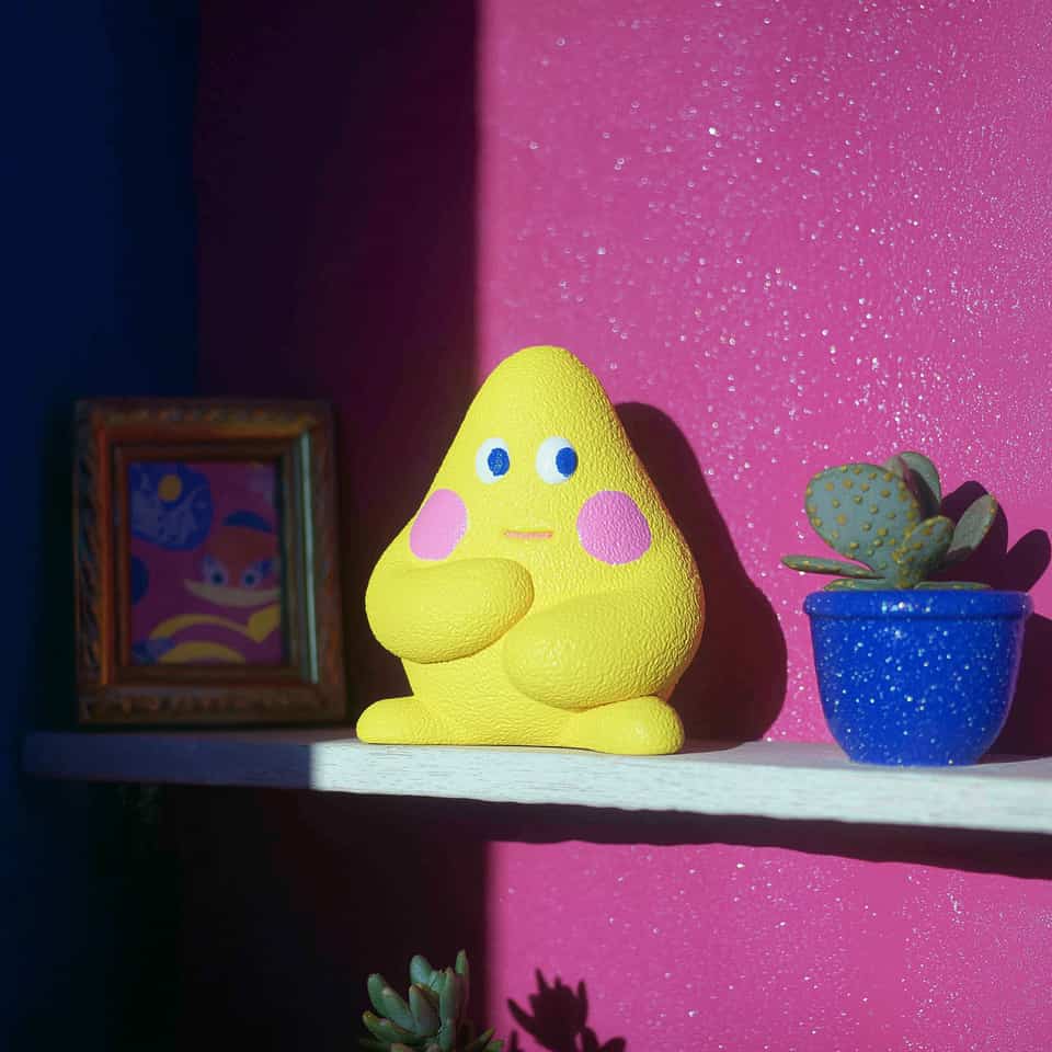 Yellow Polymer Clay Textured Blob Desk Buddy Figurine shown in styled display context with object size and surface texture visible. Handmade figurine using sculpting, finished wit…