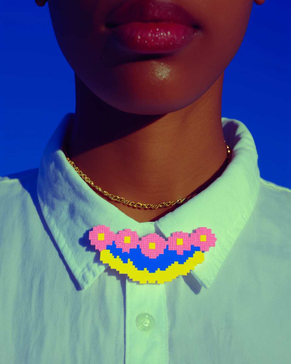 Pink Polymer Clay Pixel Flower Bib Statement Necklace shown in styled wear context with size, drape, and hardware visible. Handmade pixel construction necklace with satin finish f…